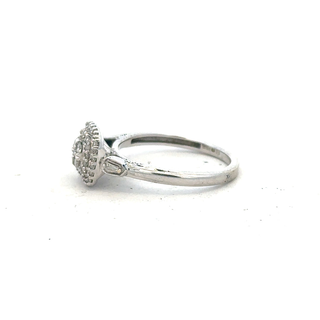 9ct white gold diamond ring in size K with sparkling diamonds, showcasing elegant jewelry design.