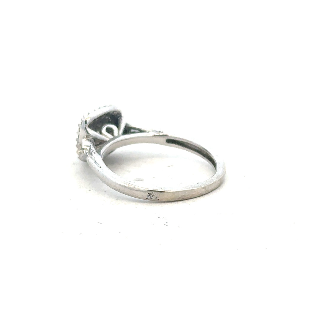 9ct white gold diamond ring in size K, featuring sparkling diamonds and a polished band, unbranded jewelry piece.