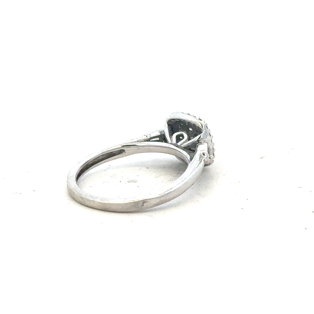 9ct white gold diamond ring in size K with sparkling diamonds, showcasing elegant design and fine craftsmanship.