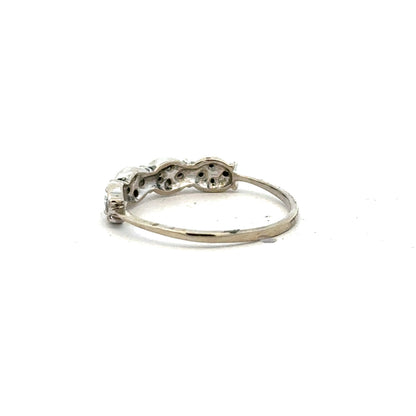 9ct white gold diamond ring in size K1/2 with sparkling diamonds, showcasing elegant jewelry design.