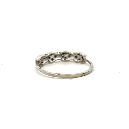 9ct white gold diamond ring in size K1/2 with sparkling diamonds, showcasing elegant jewelry design.