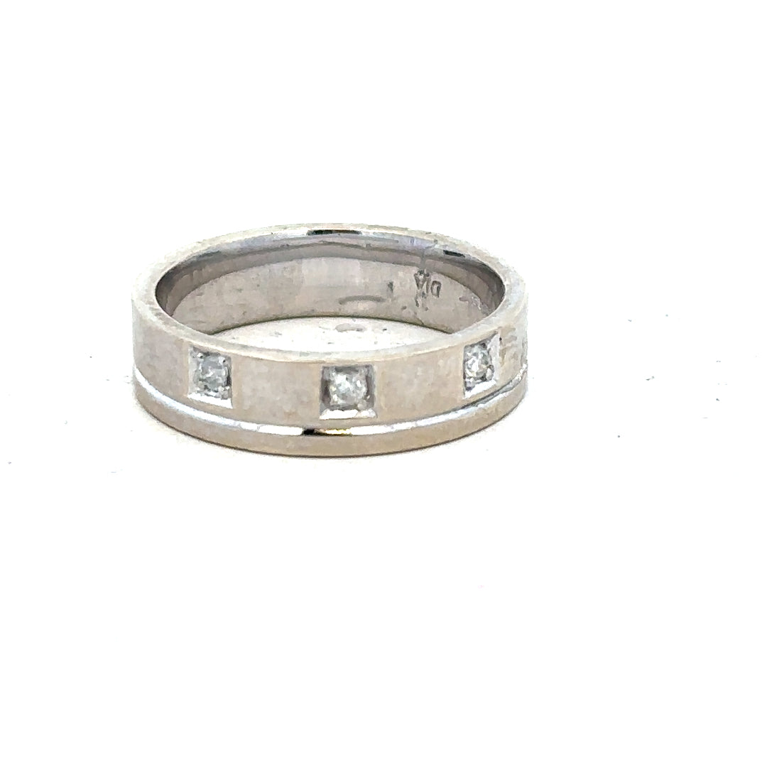 9ct white gold diamond ring in size K1/2 featuring a sparkling diamond setting and a sleek, polished band.