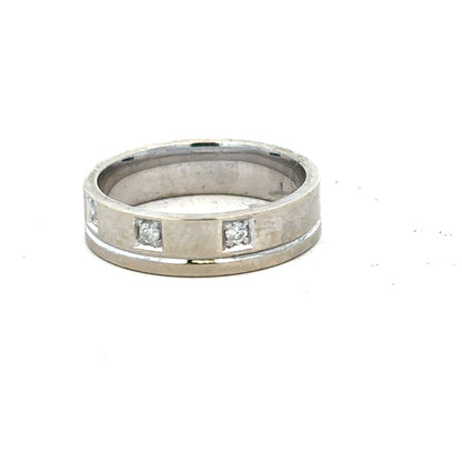 9ct white gold diamond ring size K1/2 with sparkling diamonds and polished band, showcasing elegant jewelry design.