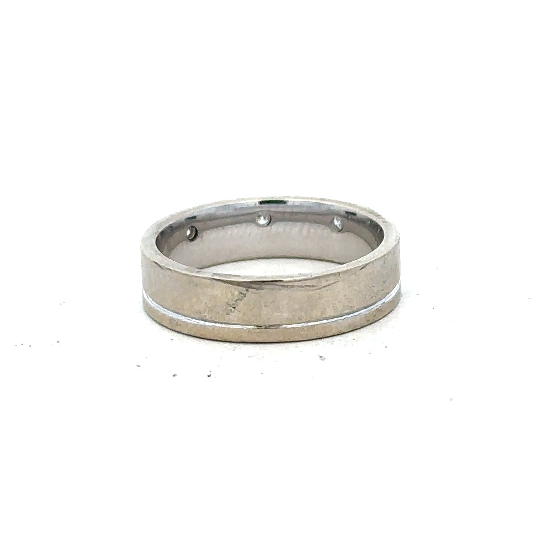 9ct white gold diamond ring size K1/2 with sparkling diamonds, featuring a sleek band and elegant design.