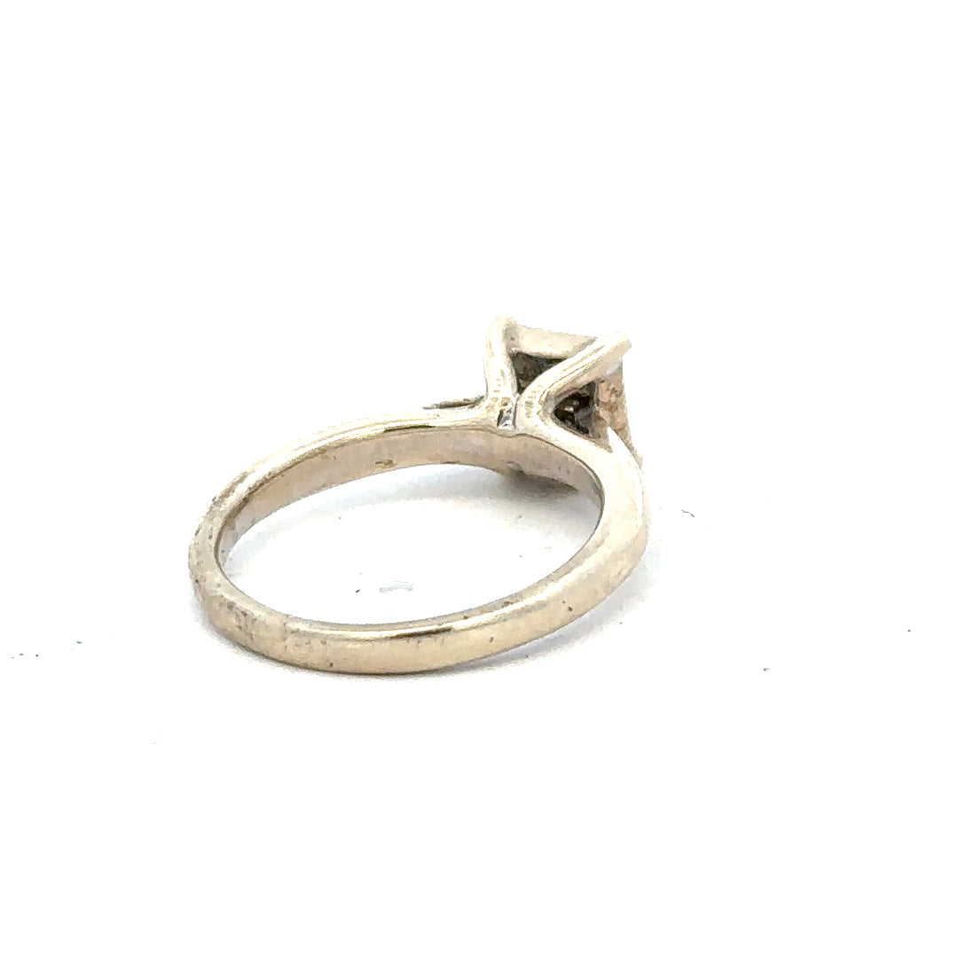 9ct white gold diamond ring in size L1/2, featuring a sparkling diamond setting and a sleek, elegant design.