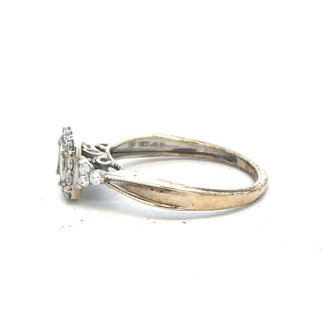 9ct white gold diamond ring in size N, showcasing sparkling diamonds and a sleek band, weighing 2.3 grams.