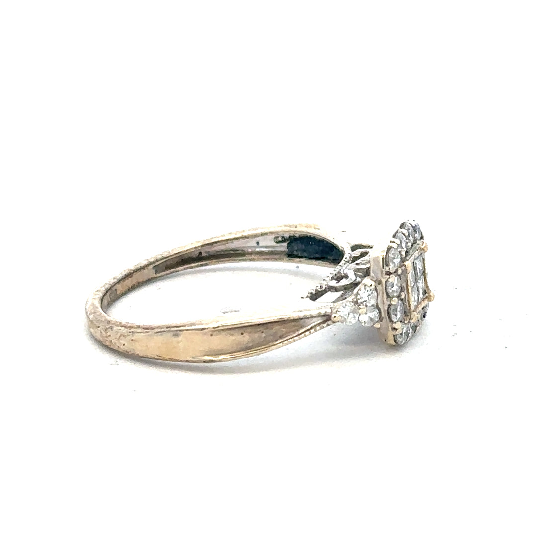 9ct white gold diamond ring size N with intricate design and sparkling diamonds, weighing 2.3 grams.