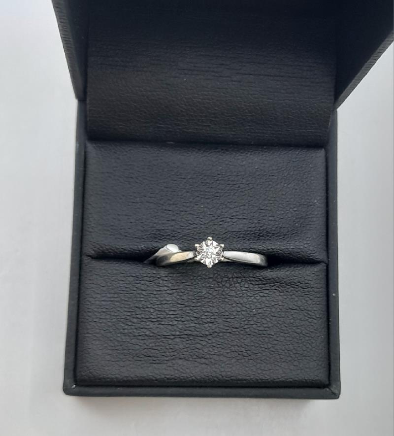 9ct white gold diamond ring in size N with sparkling diamonds, unbranded jewelry showcasing elegant design.