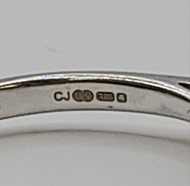 9ct white gold diamond ring in size N with sparkling diamonds, showcasing an elegant and detailed jewelry design.