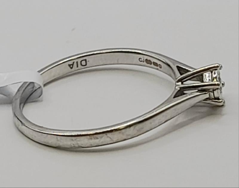 9ct white gold diamond ring in size N with sparkling diamonds, showcasing elegant jewelry craftsmanship.