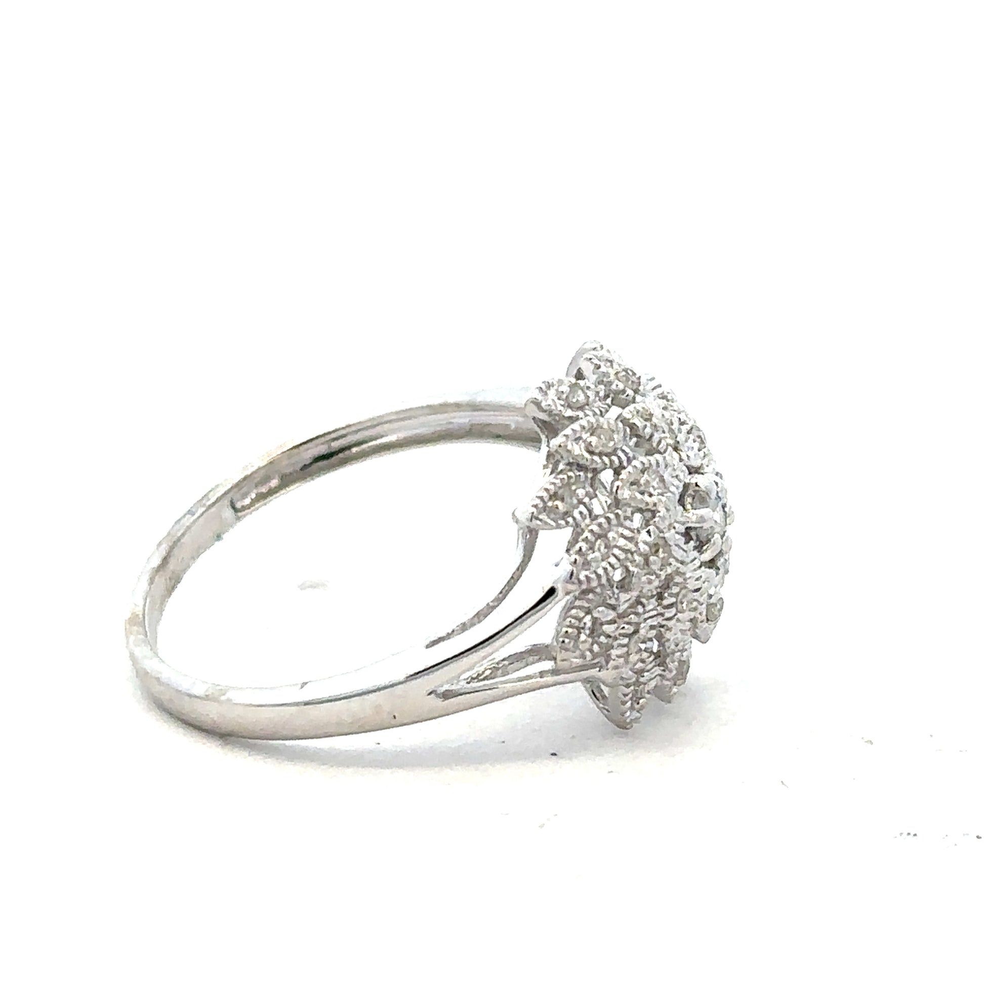 9ct white gold diamond ring size N with sparkling diamonds, showcasing elegant jewelry design and craftsmanship.