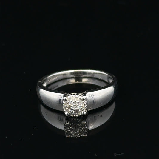 9ct white gold diamond ring in size N1/2, featuring sparkling diamonds and a sleek band, unbranded jewelry accessory.