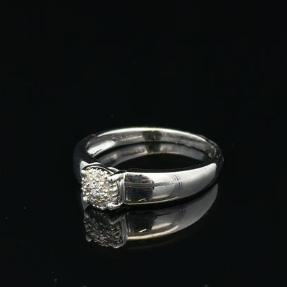 9ct white gold diamond ring with a central diamond, size N1/2, featuring a sleek band and sparkling gemstone.