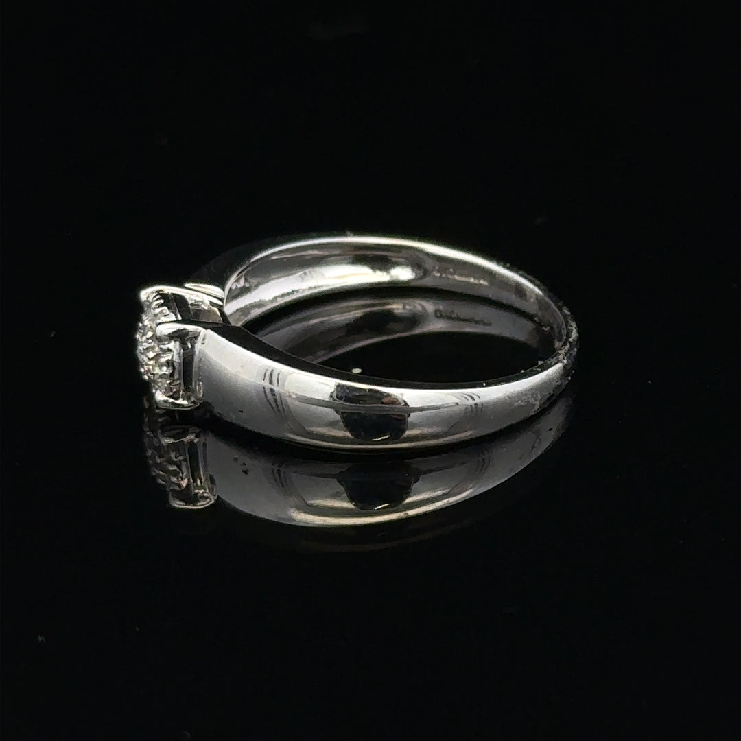 9ct white gold diamond ring in size N1/2 featuring sparkling diamonds, showcasing elegant craftsmanship and fine jewelry design.