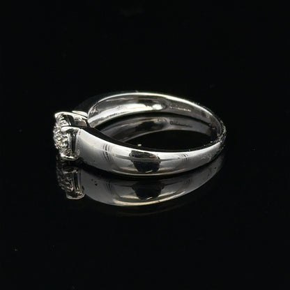 9ct white gold diamond ring in size N1/2 featuring sparkling diamonds, showcasing elegant craftsmanship and fine jewelry design.