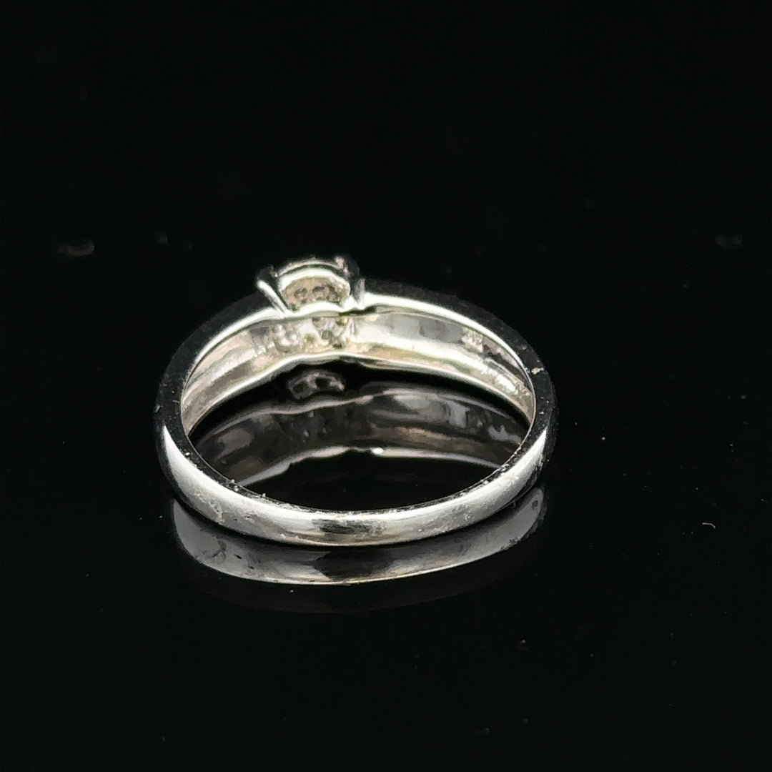 9ct white gold diamond ring in size N1/2 with sparkling diamonds, showcasing elegant jewelry design.