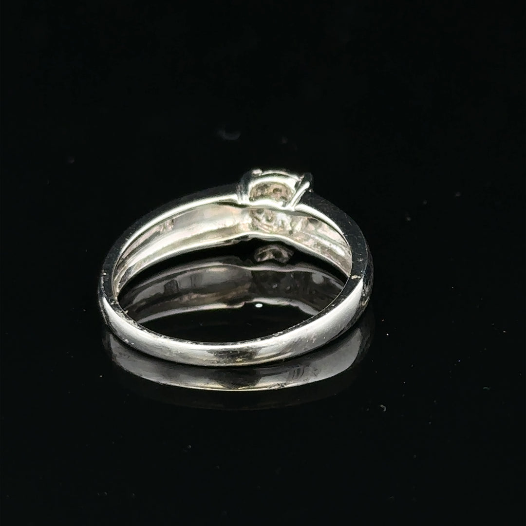 9ct white gold diamond ring in size N1/2 with sparkling diamonds, showcasing elegant jewelry design.