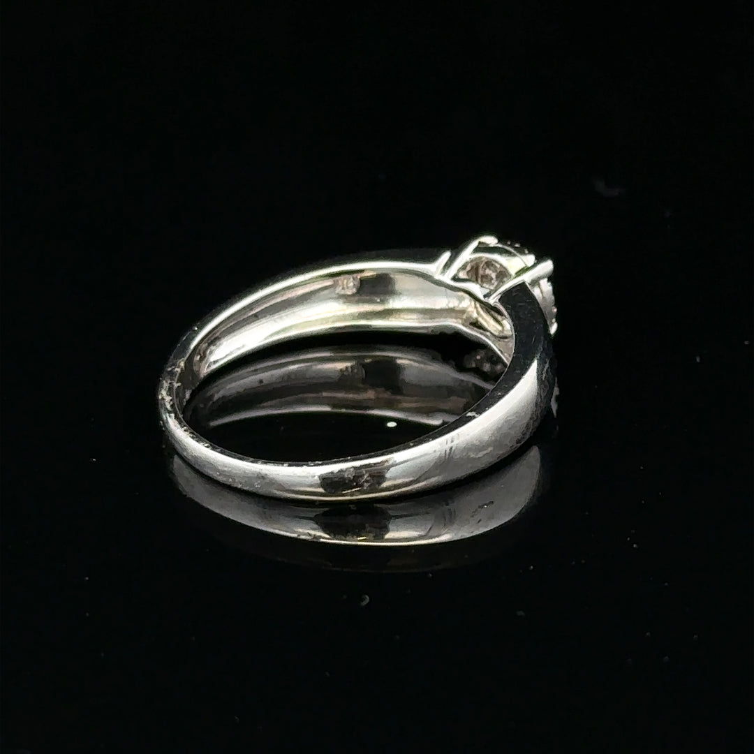 9ct white gold diamond ring in size N½, featuring sparkling diamonds and a sleek, elegant design.