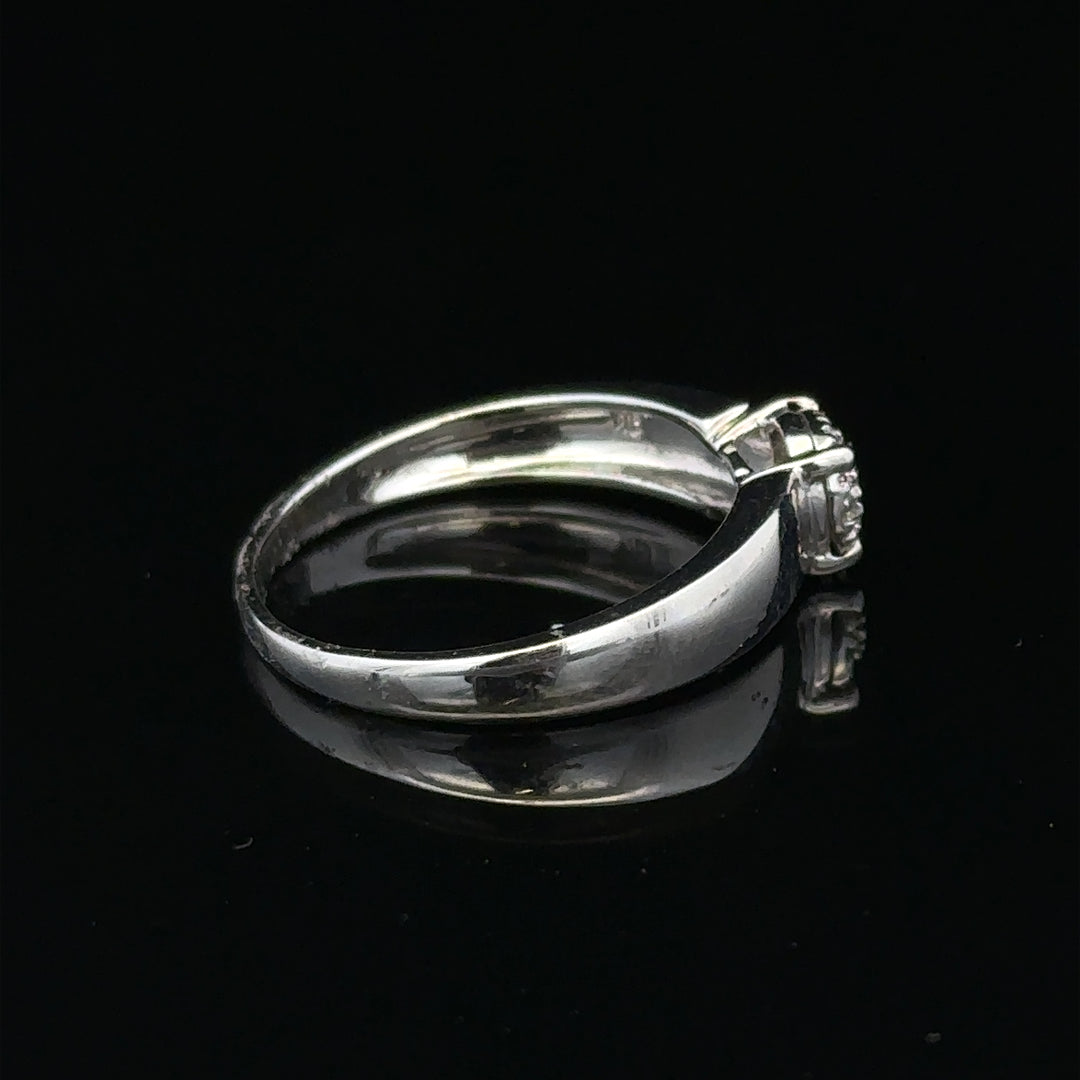 9ct white gold diamond ring in size N1/2 with sparkling diamonds, unbranded jewelry piece showcasing elegant design.