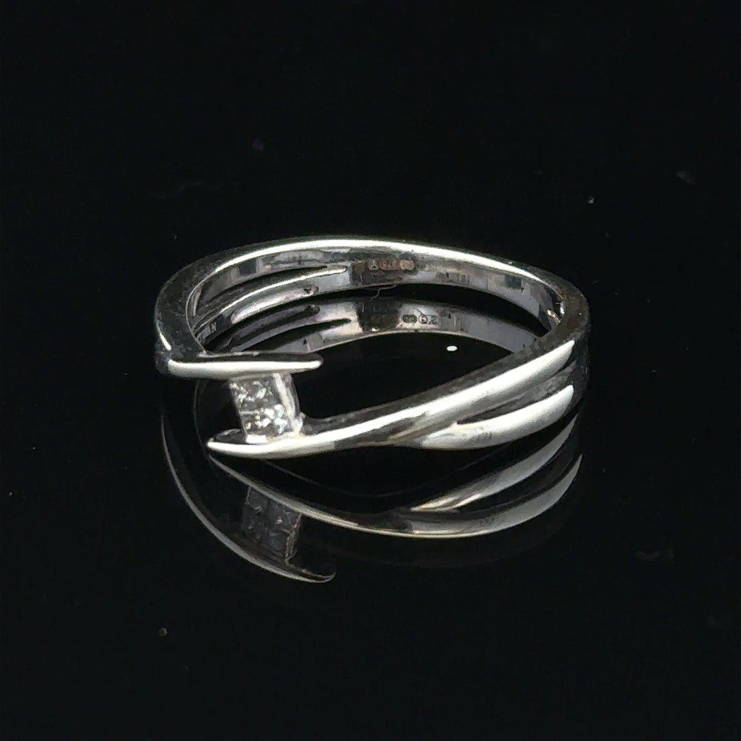 9ct white gold diamond ring in size O with sparkling diamonds, showcasing elegant jewelry design.