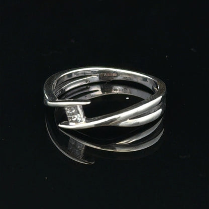 9ct white gold diamond ring in size O with sparkling diamonds, showcasing elegant jewelry design.
