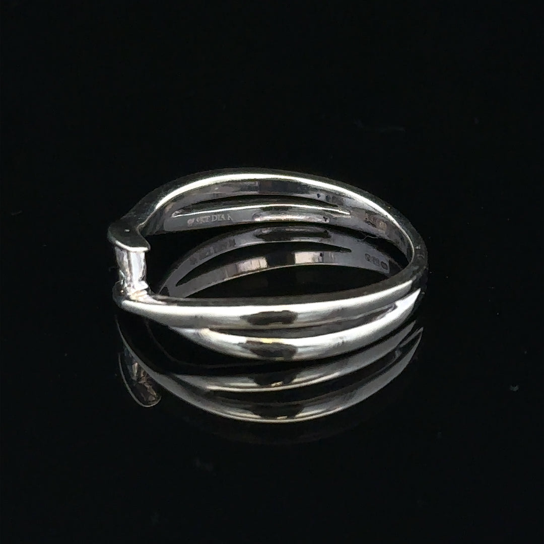 9ct white gold diamond ring in size O, featuring a sparkling diamond and elegant design, unbranded jewelry accessory
