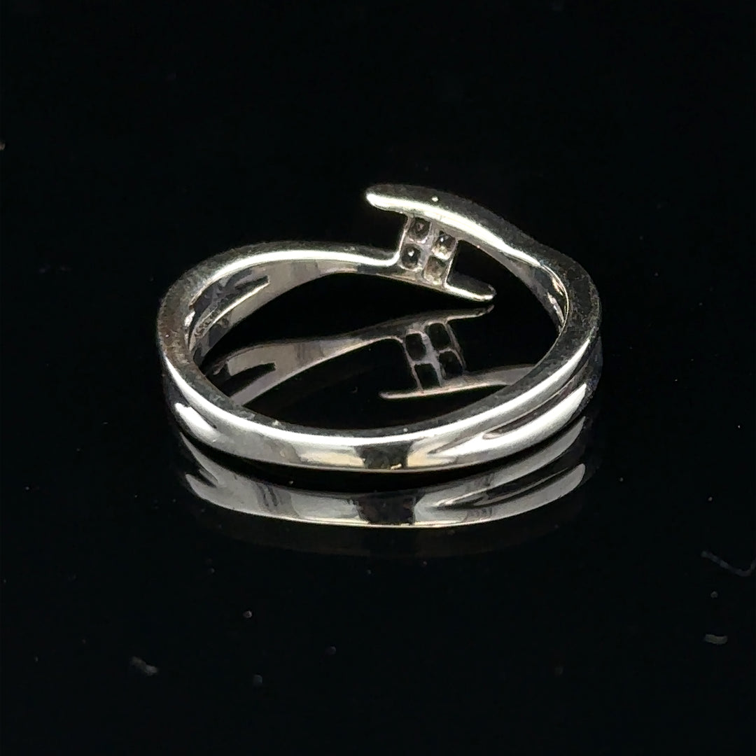 9ct white gold diamond ring in size O featuring a sparkling diamond centerpiece, unbranded, elegant jewelry accessory.