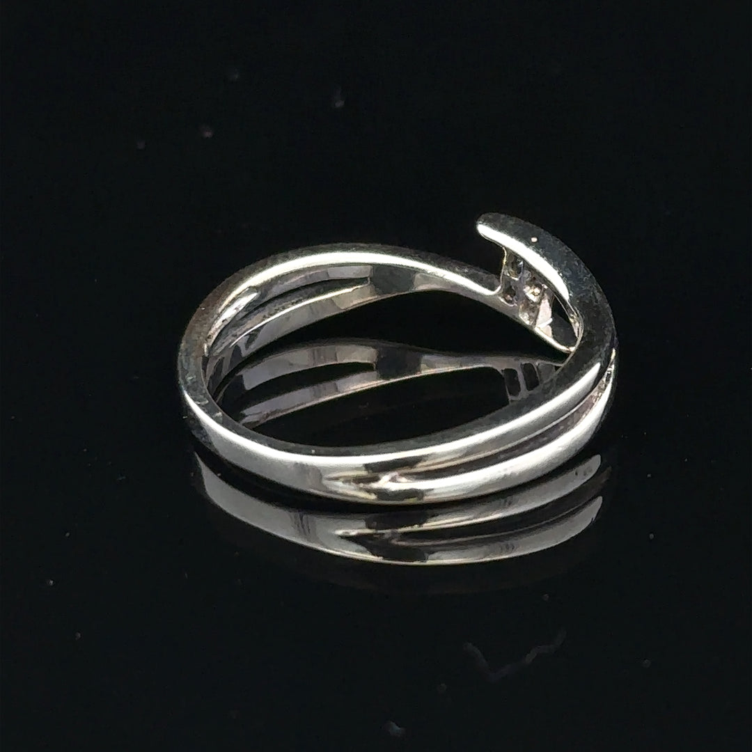 9ct white gold diamond ring in size O with sparkling diamonds, showcasing elegant jewelry craftsmanship.