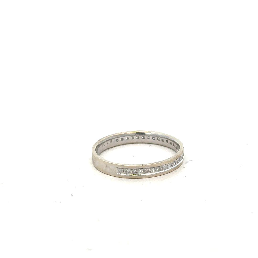 9ct white gold diamond ring size O1/2 with sparkling diamonds, elegant jewelry piece showcasing a polished band and intricate design.