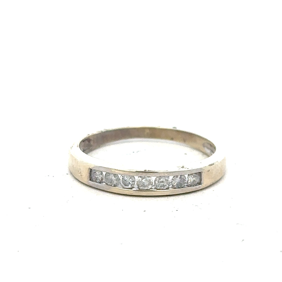 9ct white gold diamond ring in size Q with sparkling diamonds, showcasing a delicate and elegant jewelry design.