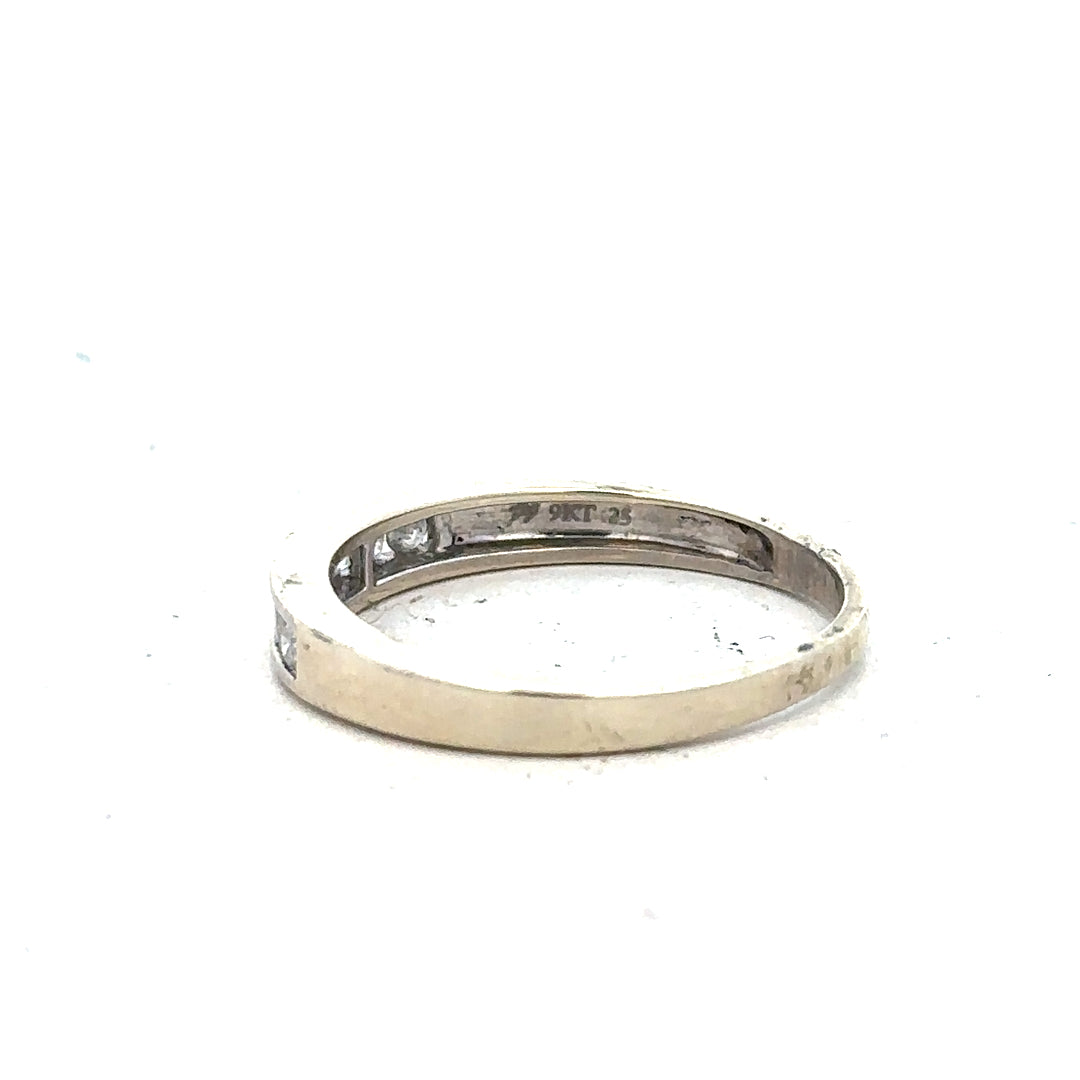 9ct white gold diamond ring in size Q with sparkling diamonds, featuring a sleek, elegant design.