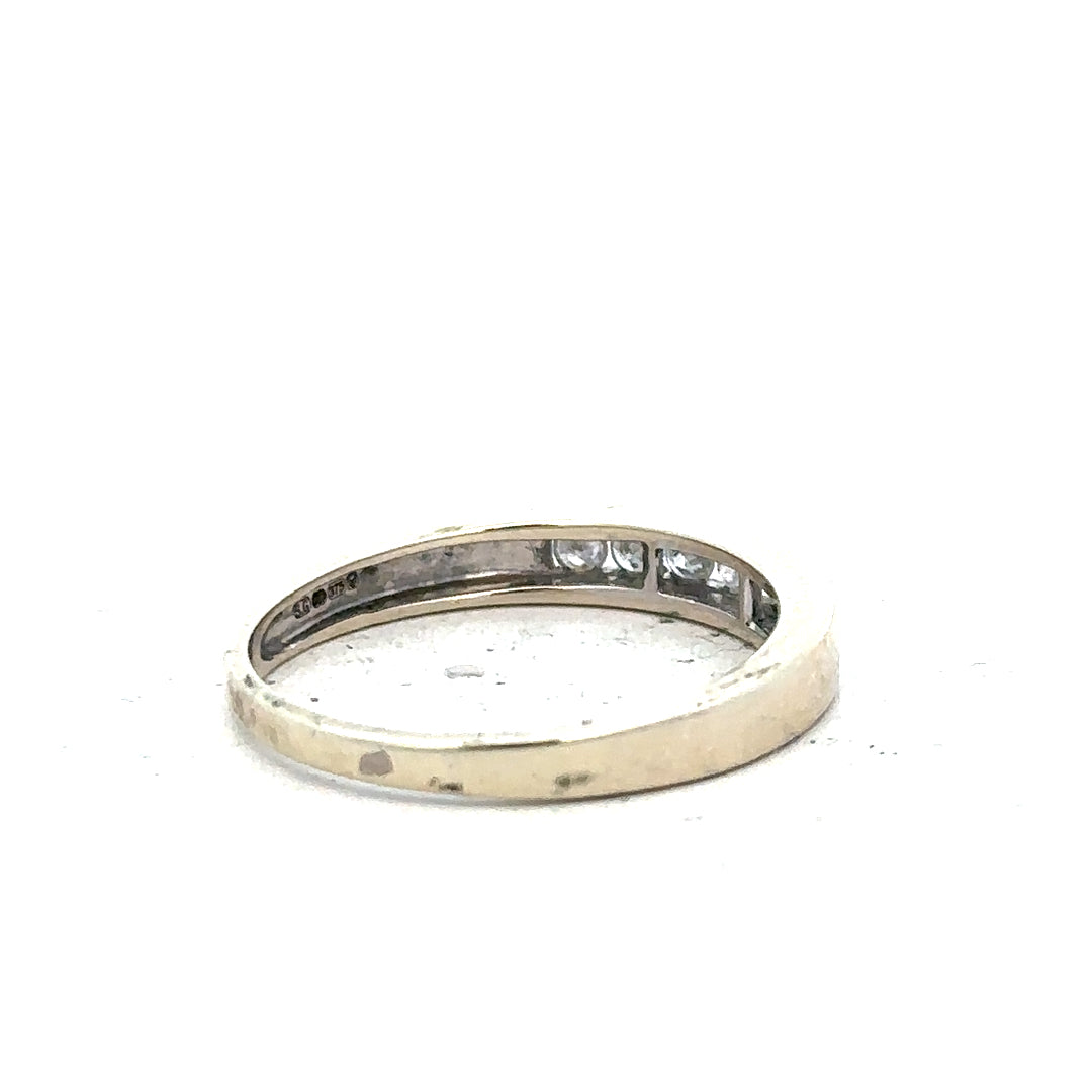 9ct white gold diamond ring in size Q with sparkling diamonds, showcasing a sleek and elegant jewelry design.