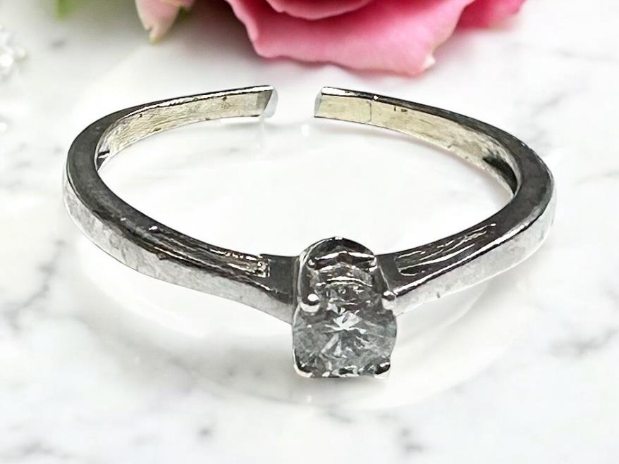 9ct white gold diamond ring in size Q1/2 with sparkling diamonds, featuring a sleek and elegant design.