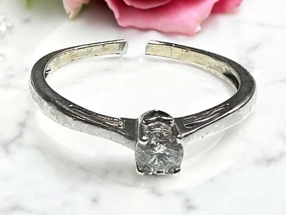 9ct white gold diamond ring in size Q1/2 with sparkling diamonds, featuring a sleek and elegant design.