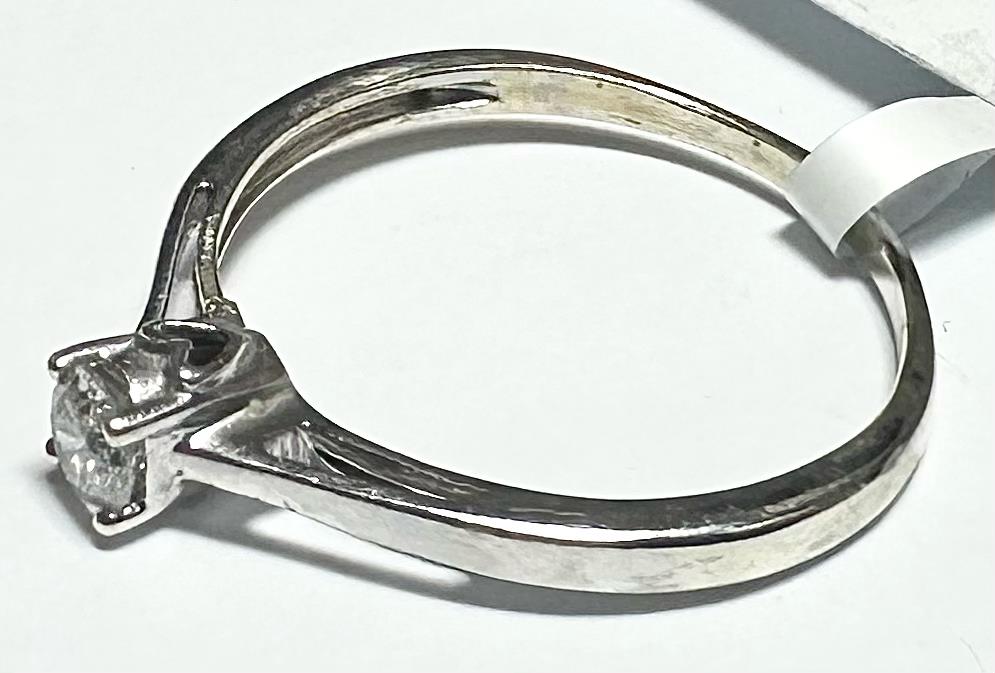9ct white gold diamond ring in size Q1/2, featuring sparkling diamonds and a sleek band design.