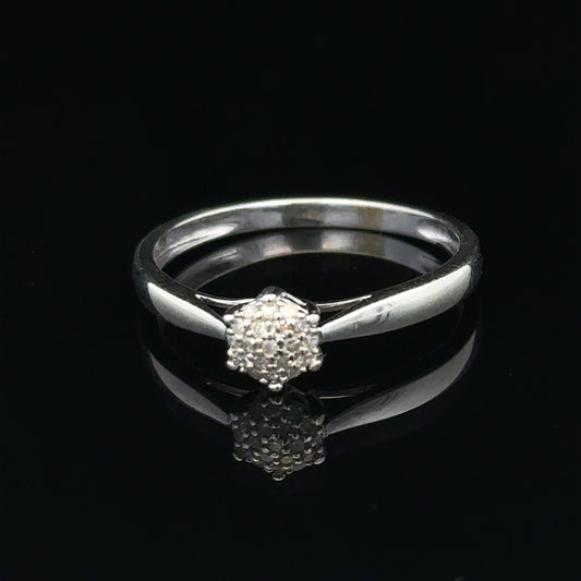 9ct white gold diamond ring in size R1/2, featuring a sparkling diamond set in a sleek, elegant band.