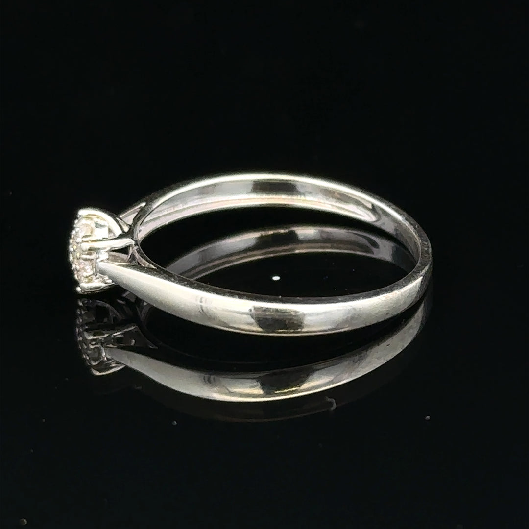 9ct white gold diamond ring size R1/2 with sparkling diamonds, showcasing a sleek and elegant design.