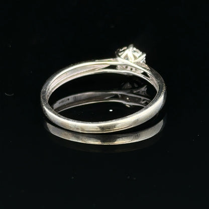 9ct white gold diamond ring size R1/2 featuring a sparkling diamond set in elegant gold band.