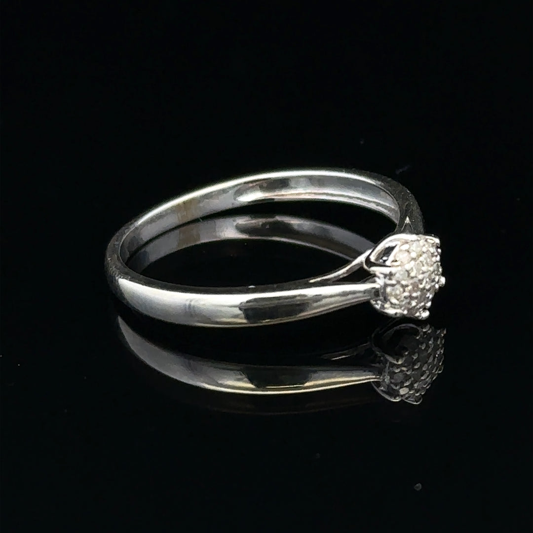 9ct white gold diamond ring size R1/2, unbranded, featuring a sparkling diamond setting and polished band.