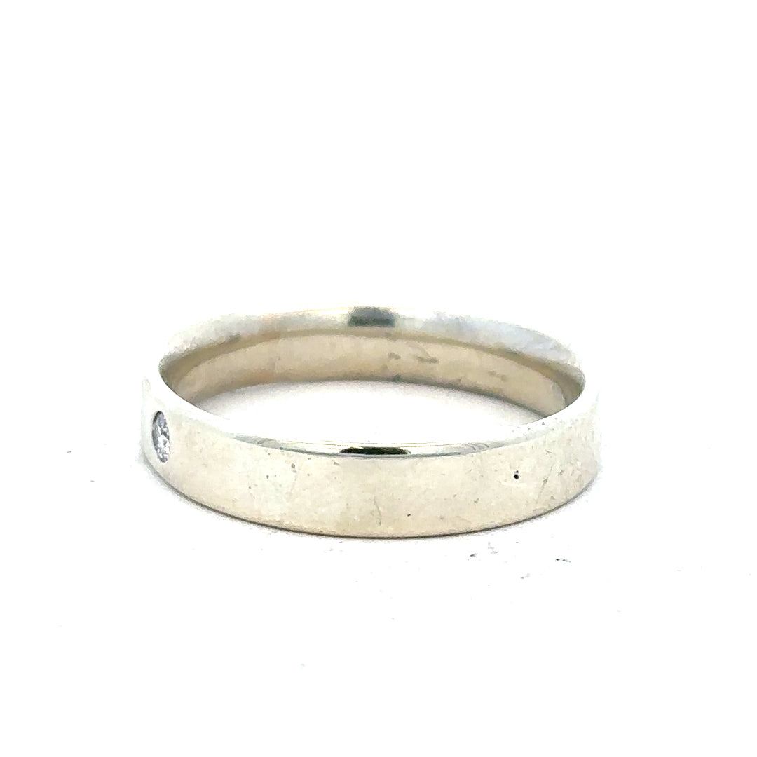 9ct white gold diamond ring in size V featuring sparkling diamonds, elegant and timeless jewelry piece.