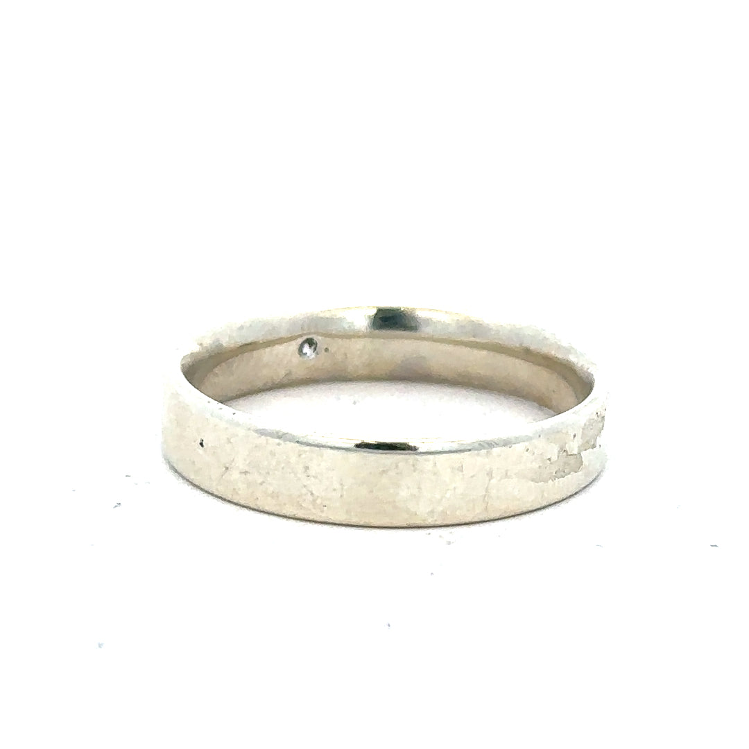 9ct white gold diamond ring size V with sparkling diamonds, showcasing a elegant design and shiny finish.