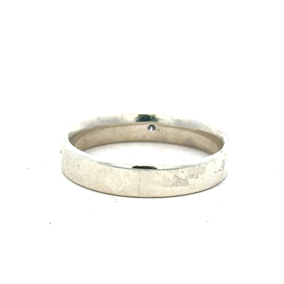9ct white gold diamond ring in size V with sparkling diamonds, showcasing elegant jewelry design.