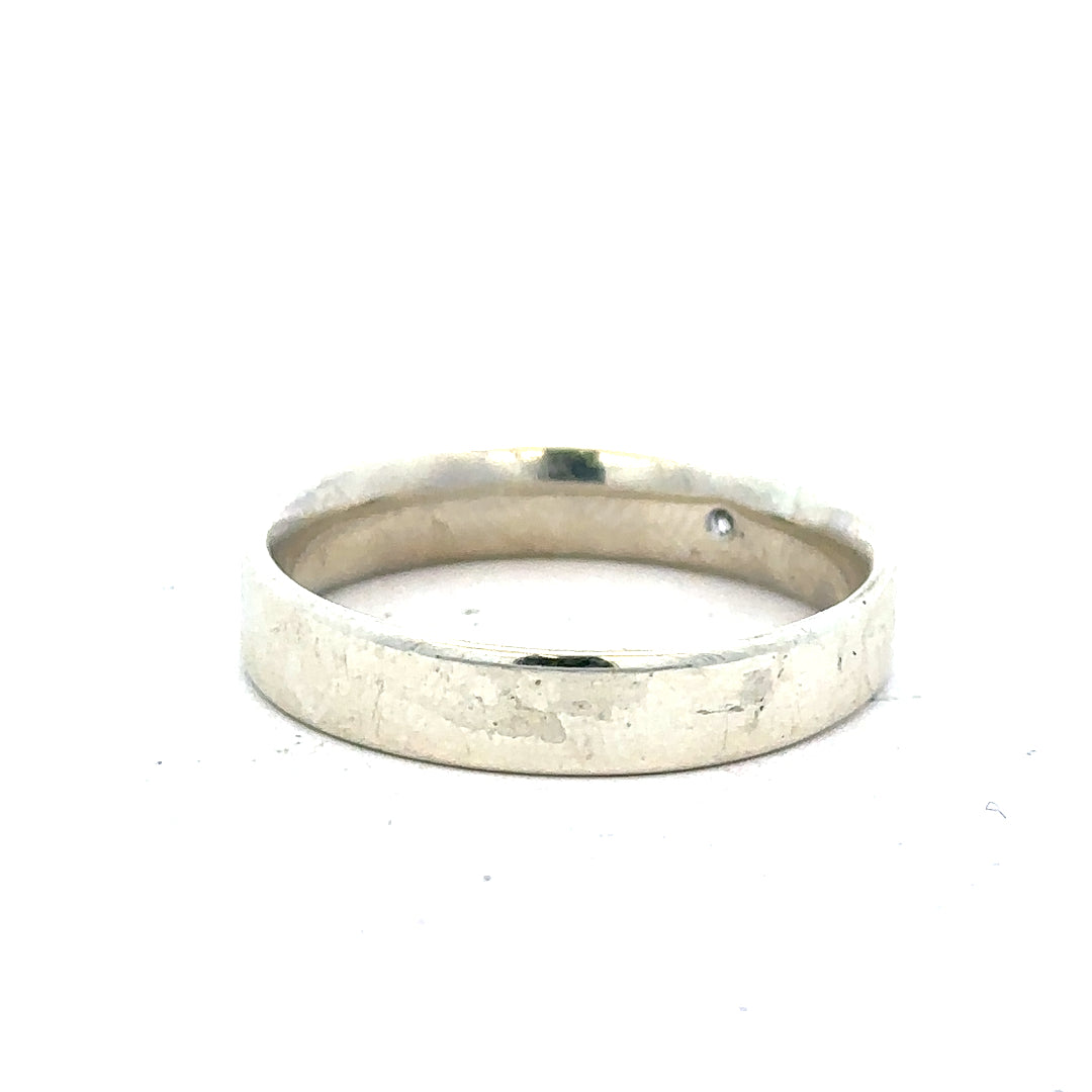 9ct white gold diamond ring in size V with sparkling diamonds, featuring a sleek and elegant design.