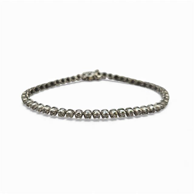 9ct white gold diamond tennis bracelet with sparkling diamonds, elegant jewelry piece featuring a classic design.