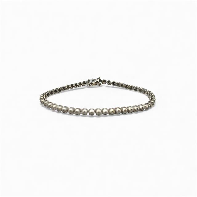 9ct white gold diamond tennis bracelet featuring sparkling diamonds on a sleek, elegant chain with secure clasp.