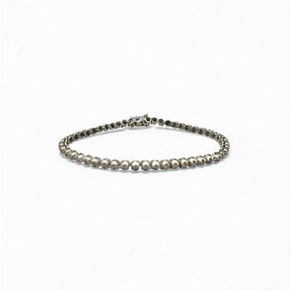 9ct white gold diamond tennis bracelet featuring sparkling diamonds on a sleek, elegant chain with secure clasp.