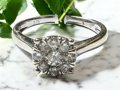 9ct white gold lab-grown diamond ring in size M with sparkling diamonds, featuring a sleek and elegant design.