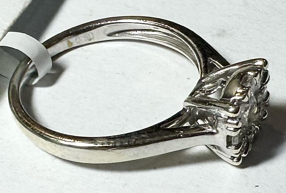 9ct white gold lab-grown diamond ring in size M with sparkling diamonds, showcasing elegant jewelry craftsmanship.