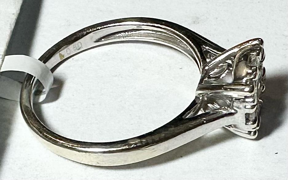 9ct white gold lab-grown diamond ring in size M with a sleek band and sparkling diamonds, elegant and modern jewelry piece.