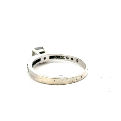 9ct white gold mossainte ring in size R, featuring a detailed mossainte gemstone setting on a sleek band.